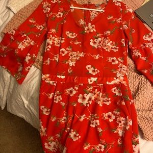 Orange Floral Romper!